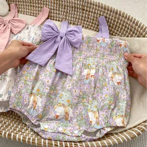 Floral baby girl romper with cute cartoon bunny print and large purple shoulder bows