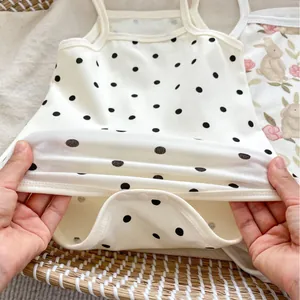 Stretchy polka dot and rabbit print baby bodysuits with snap buttons in soft knit cotton