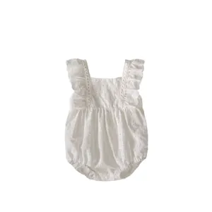 Baby girl white eyelet embroidery romper with ruffle sleeves and floral patterns