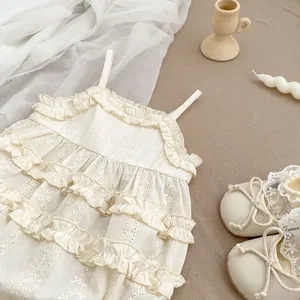 Vintage baby girl embroidered romper with floral lace layers and matching crib shoes