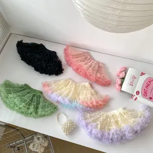 Multi-color breathable tulle tutu skirts for girls with elastic waistbands in flat lay view