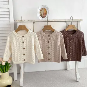 Kids vintage cable knit cotton cardigans in beige and brown with wooden buttons