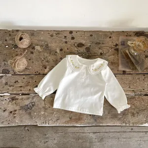 Toddler girl cream cotton knit cardigan with delicate yellow flower embroidery and lace collar