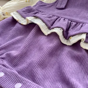 Infant girl two-piece floral top and purple corduroy suspender bodysuit with ruffles