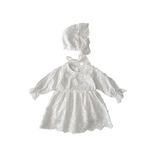 White lace long-sleeve baby girl dress set with embroidered flowers and matching bonnet