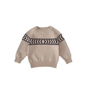 Toddler boys beige knitted sweater with navy geometric jacquard pattern and ribbed cuffs