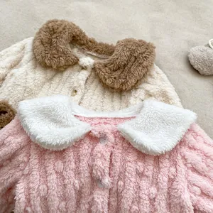 Detail view of plush coral fleece pajama cardigans with soft collars and round buttons