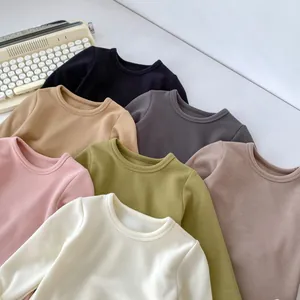 Close-up of colorful thermal base layers for kids in soft fleece fabric and six colors