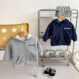 Detail of fleece lining and zipper on toddler hooded sweatshirts in grey and navy