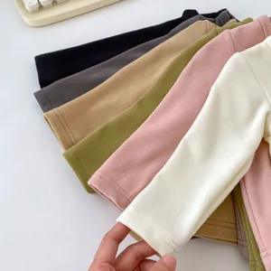 Close-up of soft thermal velvet fabric layers in diverse colors for children sets