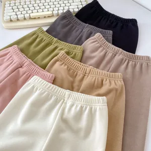 Detail of multi-color elastic waist thermal pants for toddlers in soft fleece fabric