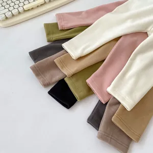 Close-up of soft brushed thermal fabric and durable stitching on toddler base layer pants