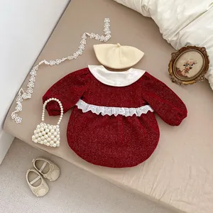 Detail of red infant dress with Peter Pan collar, beret, shoes and pearl purse