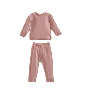 Minimalist soft fleece thermal innerwear set for infants in dusty pink long sleeve style