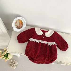 Infant winter velvet romper in red with white Peter Pan collar and lace detailing