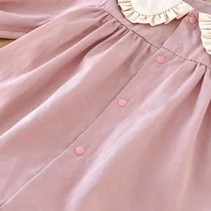 Pink toddler cardigan with cute rabbit ear ruffled collar and textured twill fabric
