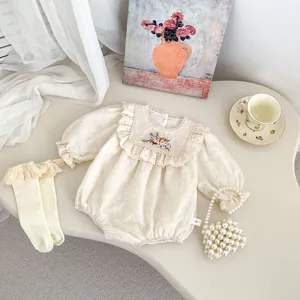 Infant floral embroidery long sleeve bodysuit set with lace details and matching socks