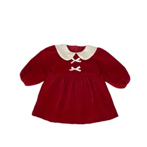 Girls red velvet princess dress with white peter pan collar and bows for festive occasions
