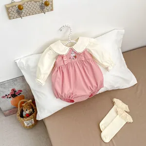 Sweet pink baby girl romper set with ruffled collar and rabbit embroidery on cream shirt