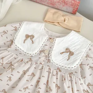 Robe bébé manches longues imprimé nœud avec col brodé et bandeau assorti