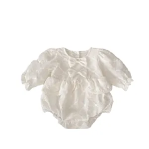 Baby girl long sleeve romper with bow decoration and delicate flower embroidery in off-white