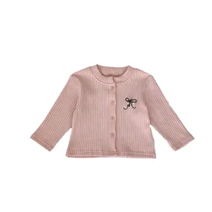 Pink ribbed knit cardigan for baby girls with embroidered bow and pearl accents