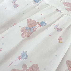 Cute baby summer romper with cartoon bear print and soft cotton linen texture