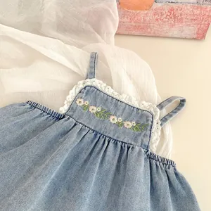 Girls denim set with floral embroidery and lace trim on sleeveless top and pants