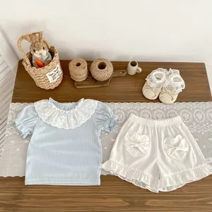 Toddler Girl Summer Clothing Set Lace Peter Pan Collar Ribbed Short Sleeve Top And White Heart Pocket Ruffle Shorts Outfit