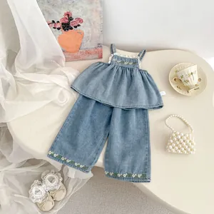 Girls denim two-piece set with floral embroidery and lace trim on wide leg pants