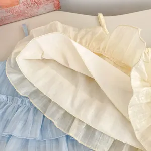 Hauts à volants jaune clair et bleu pour filles avec détails plissés pour l'été