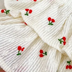 Baby girl white seersucker vest set with red cherry embroidery and tiered skirt outfit