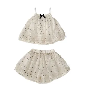 Baby girls summer polka dot tank top and shorts two-piece set with a bow accent
