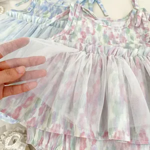 Barboteuse d'été pour bébé fille avec imprimé tie-dye et superposition en tulle