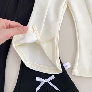Pantalon évasé de printemps pour filles avec nœud et fentes latérales en noir et crème