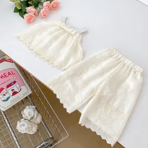 Toddler girls summer two-piece outfit with cream lace top and wide-leg trousers