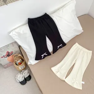 Pantalon évasé bébé fille avec fente nœud en coton noir et blanc cassé doux