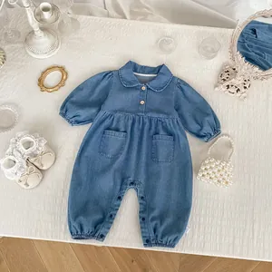 Classic blue denim baby romper with lapel collar and elastic cuffs for a retro infant style
