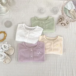 Détails de gilets de protection solaire en maille côtelée pour bébé avec nœuds