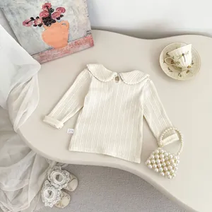 Ribbed baby girl long sleeve knit top with white lace collar and vintage accessories