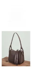 Close-up of coffee brown lychee grain leather hobo bag with adjustable silver zipper strap
