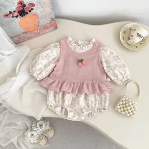 Floral long sleeve baby bodysuit and pink cherry knit vest set with ruffled collar details