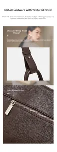 Detail of dark brown pebble leather bag with silver studs and adjustable shoulder strap