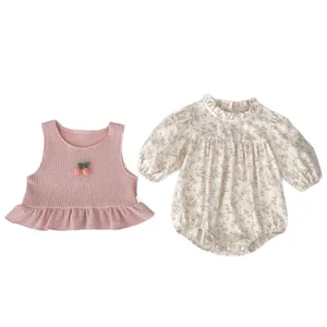 Floral baby romper set with pink waffle vest and cherry ruffle details for toddlers