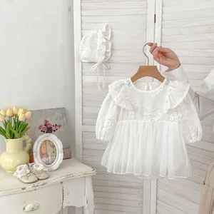 White embroidered baby tulle princess dress with matching bonnet and lace shoes