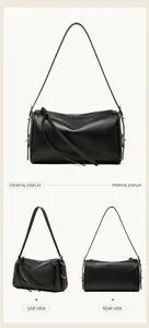 Vue triple d'un sac cylindrique en cuir noir avec détails dorés et tirette en cuir long