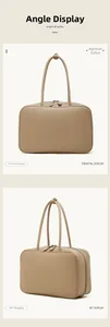 Detail view of apricot leather bowling bag showing front and side angles with double zippers