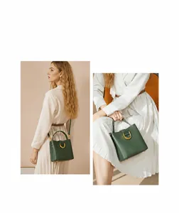 Détails d'un sac seau en cuir vert avec anneaux métalliques dorés et rivets chics