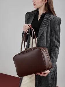 Classic dark brown leather bowling bag for women with large capacity and double handles