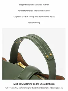 Détail du sac seau en cuir vert foncé montrant les coutures renforcées et les rivets dorés